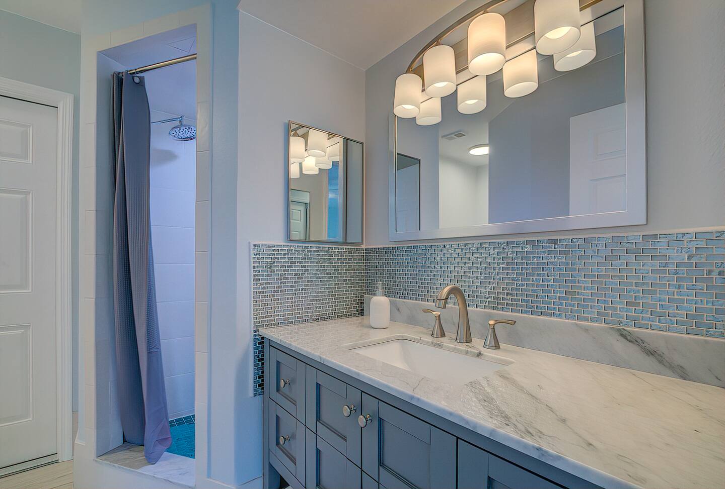 Marble bathroom with walk-in shower